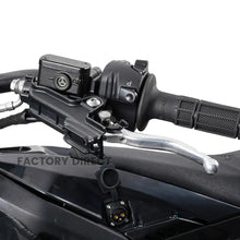 Hydraulic brake lever and switch pod on the Arctic Leopard XE Pro R, with the charging port visible below